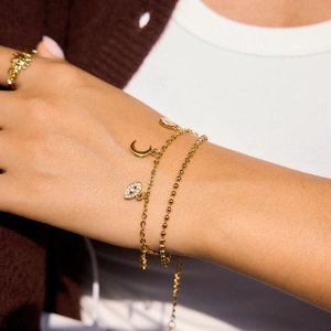 Bracelet en acier inoxydable or 18K avec breloques lune, œil et zircon blanc