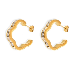 Gold plated stainless steel wave earrings with zircon stones in a floral geometric design