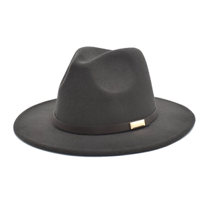 Detail of dark grey wool fedora hat with brown leather band and gold buckle