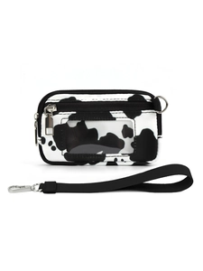 Detalle de monedero de muñeca con estampado de vaca y ranura para identificación