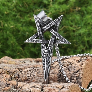Vintage stainless steel pentagram pendant with eye of horus on rustic bark background