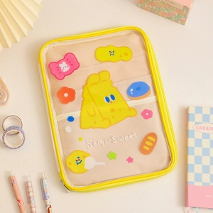 Detailed interior of yellow cartoon iPad sleeve with multi-layer mesh pockets and dividers