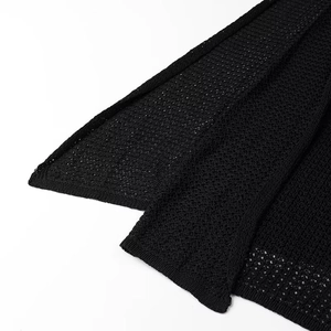 Detail shot of the black hollow knit mesh fabric on the bohemian beach maxi dress