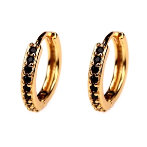 Detail of 18K gold plated hoop earrings featuring a row of elegant black zircon stones