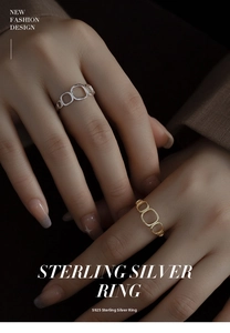Close-up of minimalist S925 sterling silver hollow geometric rings on model's hand
