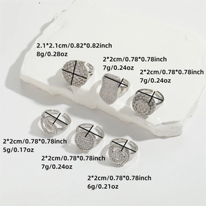 Set of silver-colored open rings with micro-pave cubic zirconia in geometric shapes