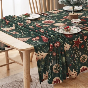 Festive dark green Christmas tablecloth with elegant red snowflake and tree patterns