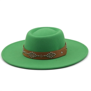Detail of green wool felt fedora featuring a brown leather strap with silver rivets