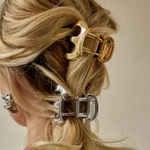Sleek metallic pumpkin hair claw clips in gold and silver finish for high ponytail styles