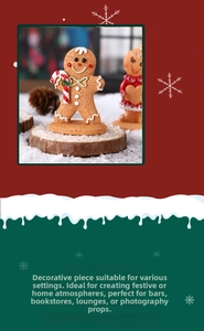 Detailed close-up of a resin gingerbread man ornament with candy cane and bow for Christmas