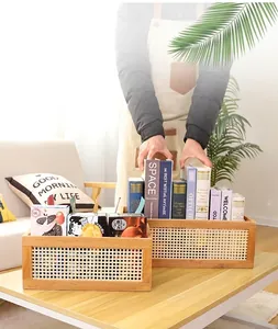 Detail of rectangular woven storage baskets with wooden frames for home organization
