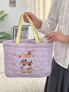 Sac fourre-tout matelassé violet avec broderies de chiens et anses jaunes