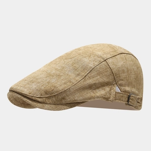 Detail view of the adjustable metal buckle and breathable linen texture on ivy cap