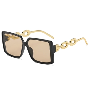 Oversized square sunglasses with black frame and chunky gold chain temples for women