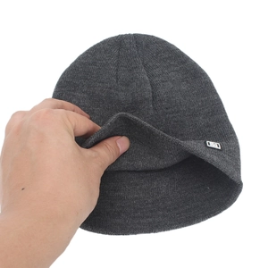 Thick dark grey knitted beanie for men and women showing double-layer warm material texture
