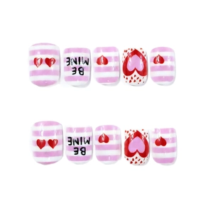 Glossy square press-on nails with pink stripes, red hearts and BE MINE artistic lettering