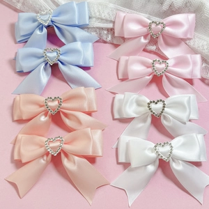 Barrettes à cheveux nœud en satin avec cœur en strass en couleurs pastel assorties