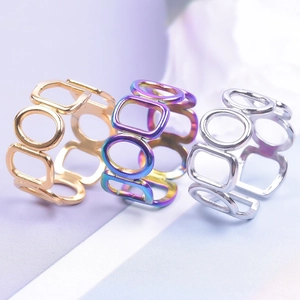Adjustable hollow geometric cutout rings in gold, silver, and rainbow iridescent colors