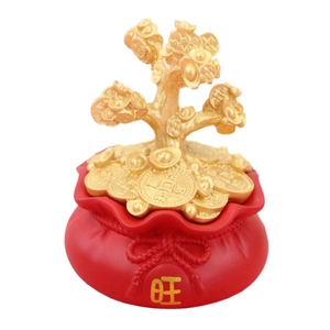 Golden fortune money tree on a red lucky bag base with gold ingots for wealth decor