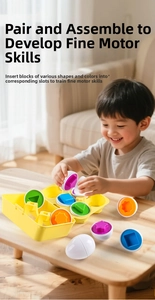 Detail of a child matching colorful geometric shapes in realistic toy eggs on a yellow tray