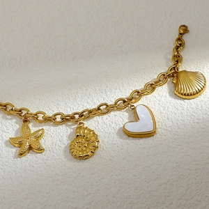 Luxury 18K gold plated stainless steel bracelet with starfish, seashell and heart charms