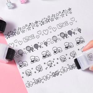 Cartoon animal roller stamps for DIY journaling featuring star and heart patterns
