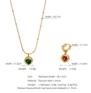 Détails du coffret bijoux en acier titane avec zircon cœur vert et caractéristiques