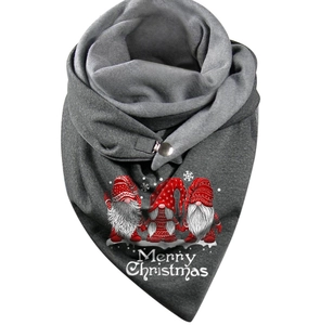 Close-up of gray scarf with Merry Christmas print and festive gnome design with metal button