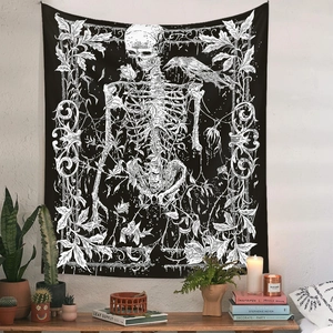 Detailed view of Gothic skull and crow tapestry hanging in a cozy living room setup