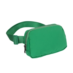 Detail view of green sports fanny pack showing zip closure and adjustable nylon strap