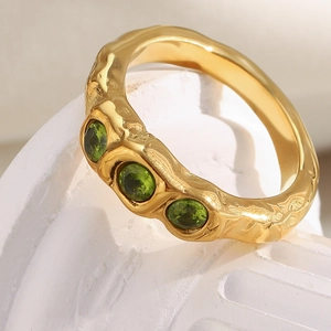 18K gold plated stainless steel wavy ring with three sparkling green zircon gemstones