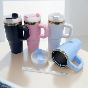 Detail view of colorful 304 stainless steel tumblers with handle, lid and interior lining
