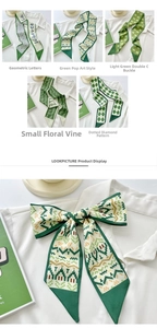 Close-up of five green floral patterns on silky scarf headband for hair or bags
