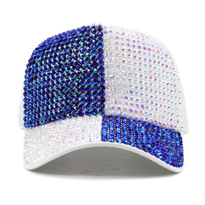 Detail of blue and white rhinestone patchwork design on a stylish baseball cap