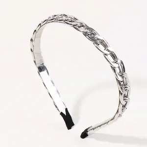 Close-up of silver metal chain headband with black protective tips for comfort