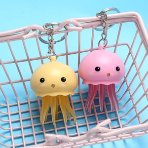 Porte-clés méduse mignons et lumineux en rose et jaune pour couples et sacs à main