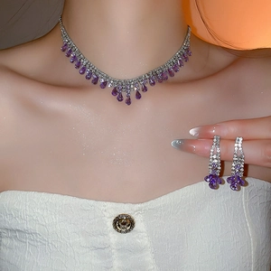 Elegant water drop tassel jewelry set with purple gemstones and clear crystals