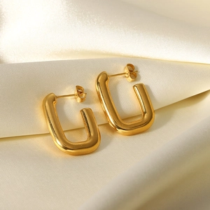 Minimalist square open hoop earrings in 18k gold plated stainless steel on satin