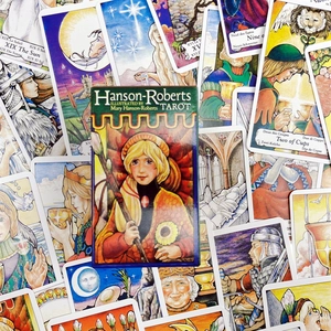 Detailed top view of Hanson-Roberts Tarot deck with cards showing XIX The Sun and Two of Cups