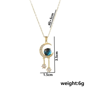 Gold celestial planet necklace with moon pendant and blue starry globe detail