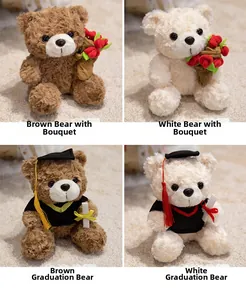 Plush teddy bears in brown and white featuring graduation gowns and red rose bouquets