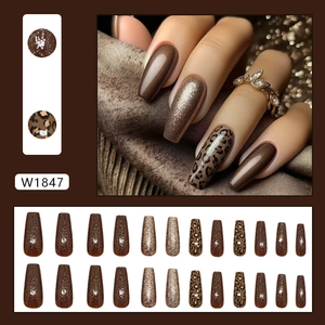Long ballerina press-on nails with leopard print and glitter in caramel tones