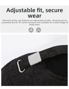 Detail of adjustable metal buckle and dark gray tweed fabric on winter baseball cap