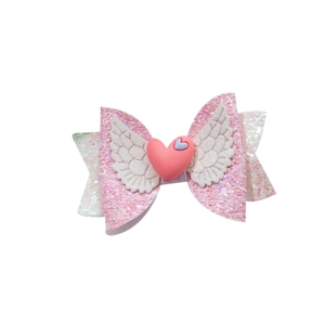 Pink glitter bow hair clip with white wings and heart detail for girls' Valentine fashion