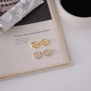 Luxurious double-hoop titanium steel earrings in gold and two-tone silver finishes