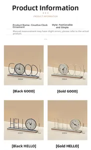 Detail view of artistic GOOD and HELLO metal desk clocks with wooden bases in gold and black