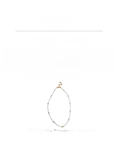 Detail showing shell pearl bead necklace with gold copper chain and adjustable clasp