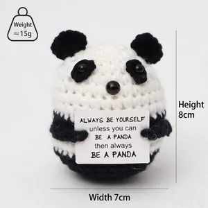 Handmade crochet panda plush holding a positive quote card for stress relief, 8cm tall