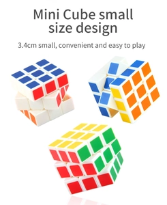 Detailed view of three 3.4cm mini 3x3 magic cubes with white frames and colorful stickers