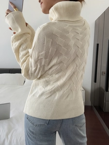 Chic white turtleneck sweater with cable knit pattern and long sleeves for women